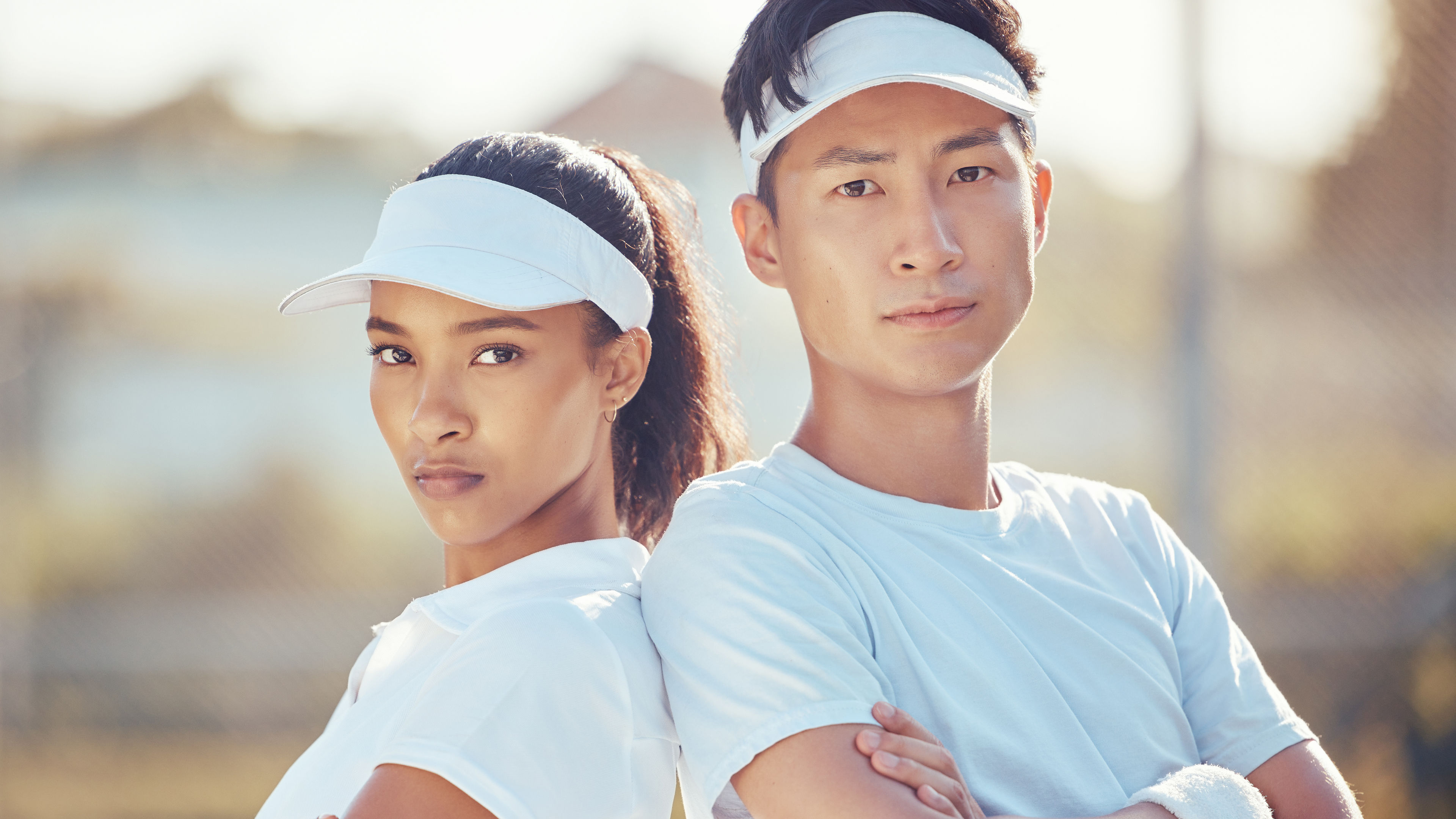 Two people playing tennis