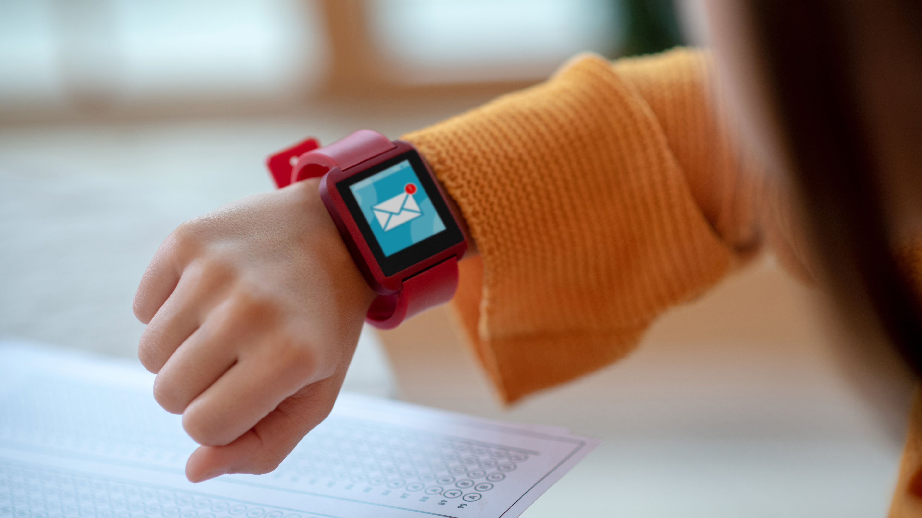 Close up of a girl's wrist with smartwatch.