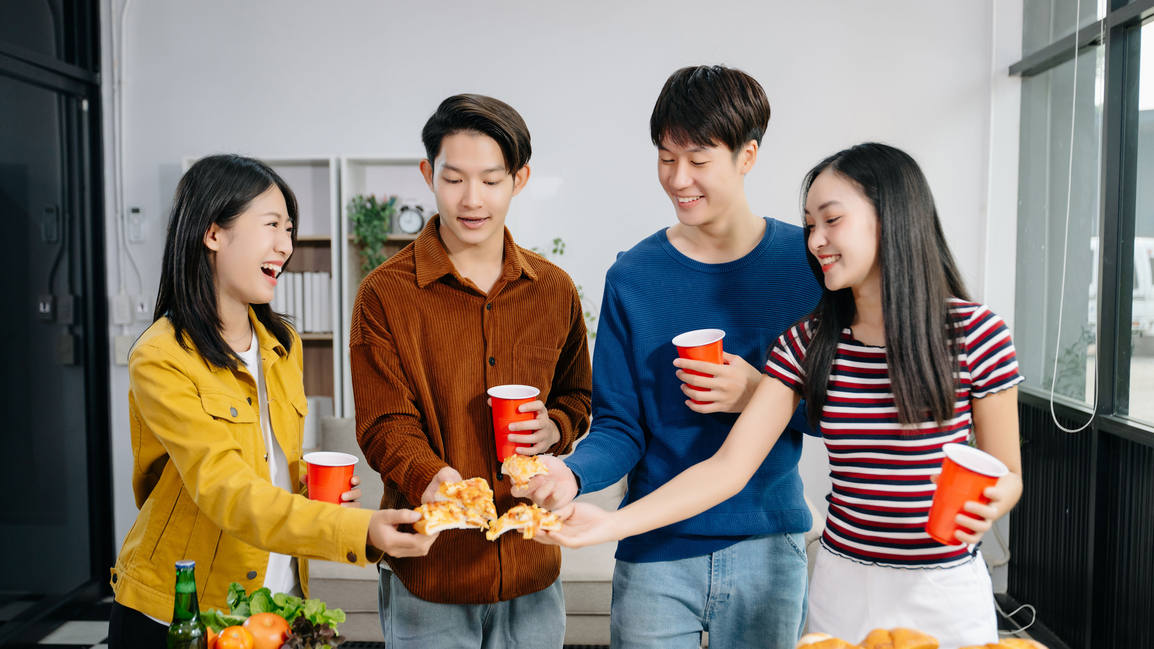 Young friend having, enjoy evening party together at home 