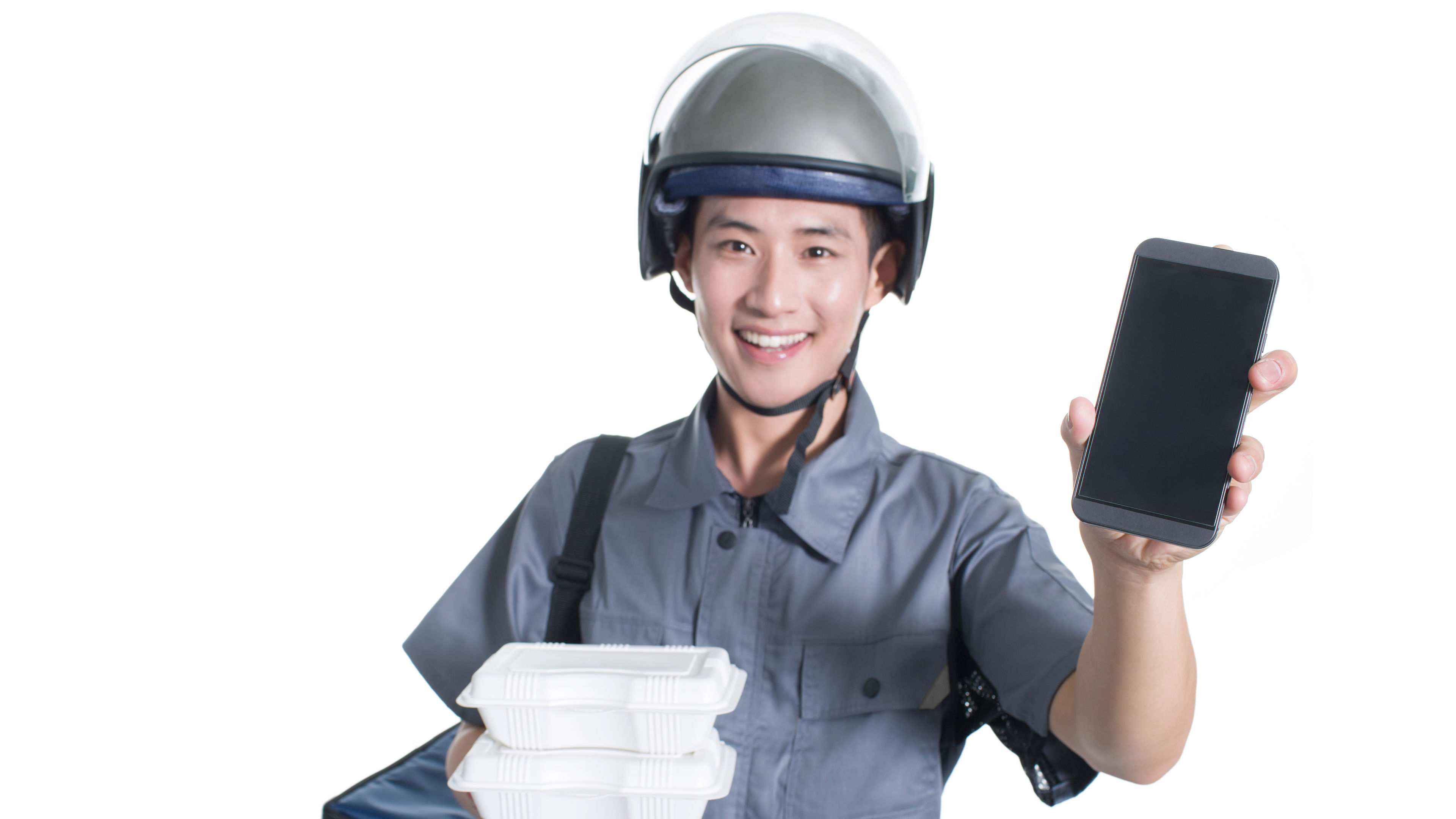 A happy delivery man with some parcels 