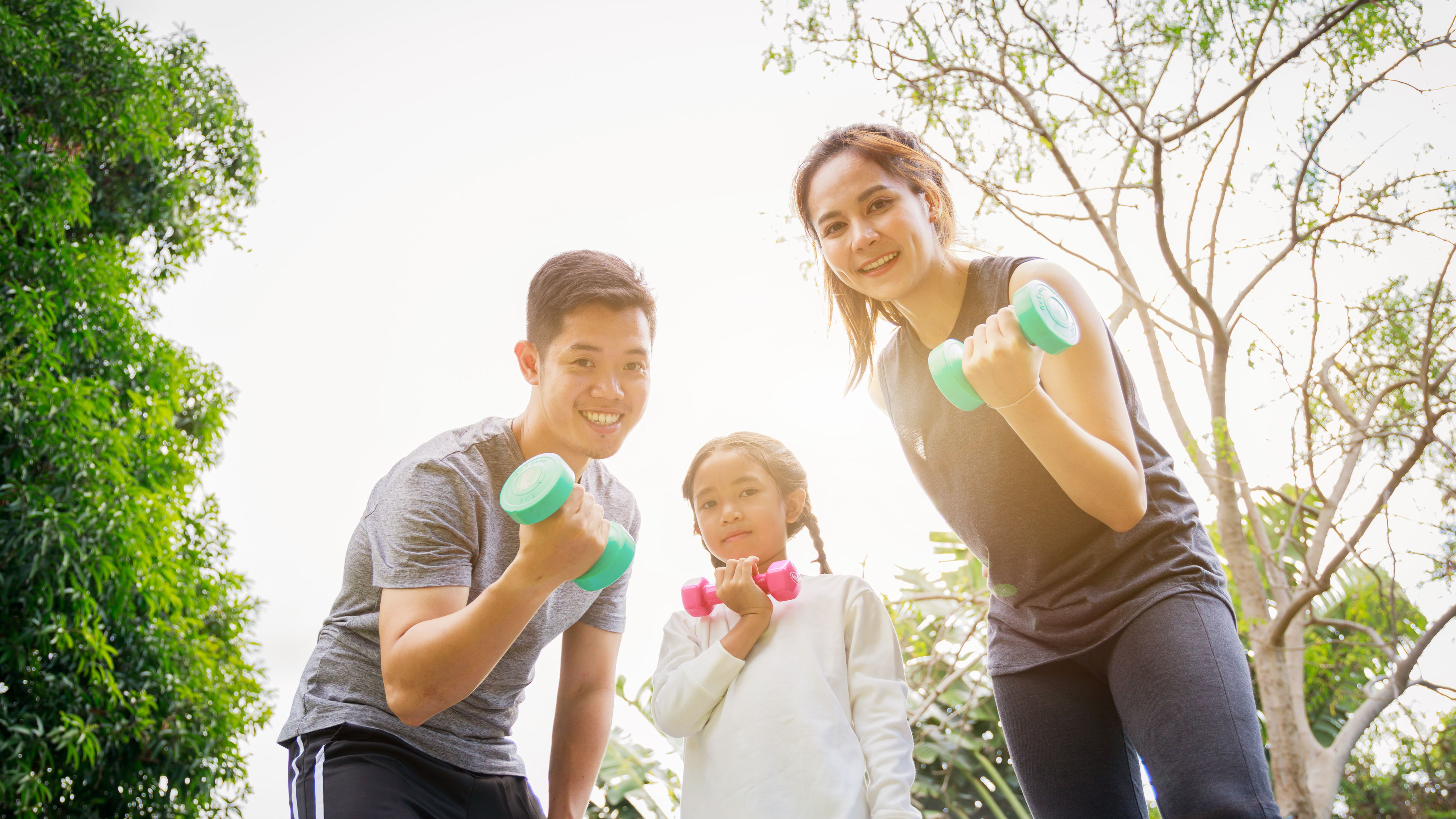 A happy family doing workout 