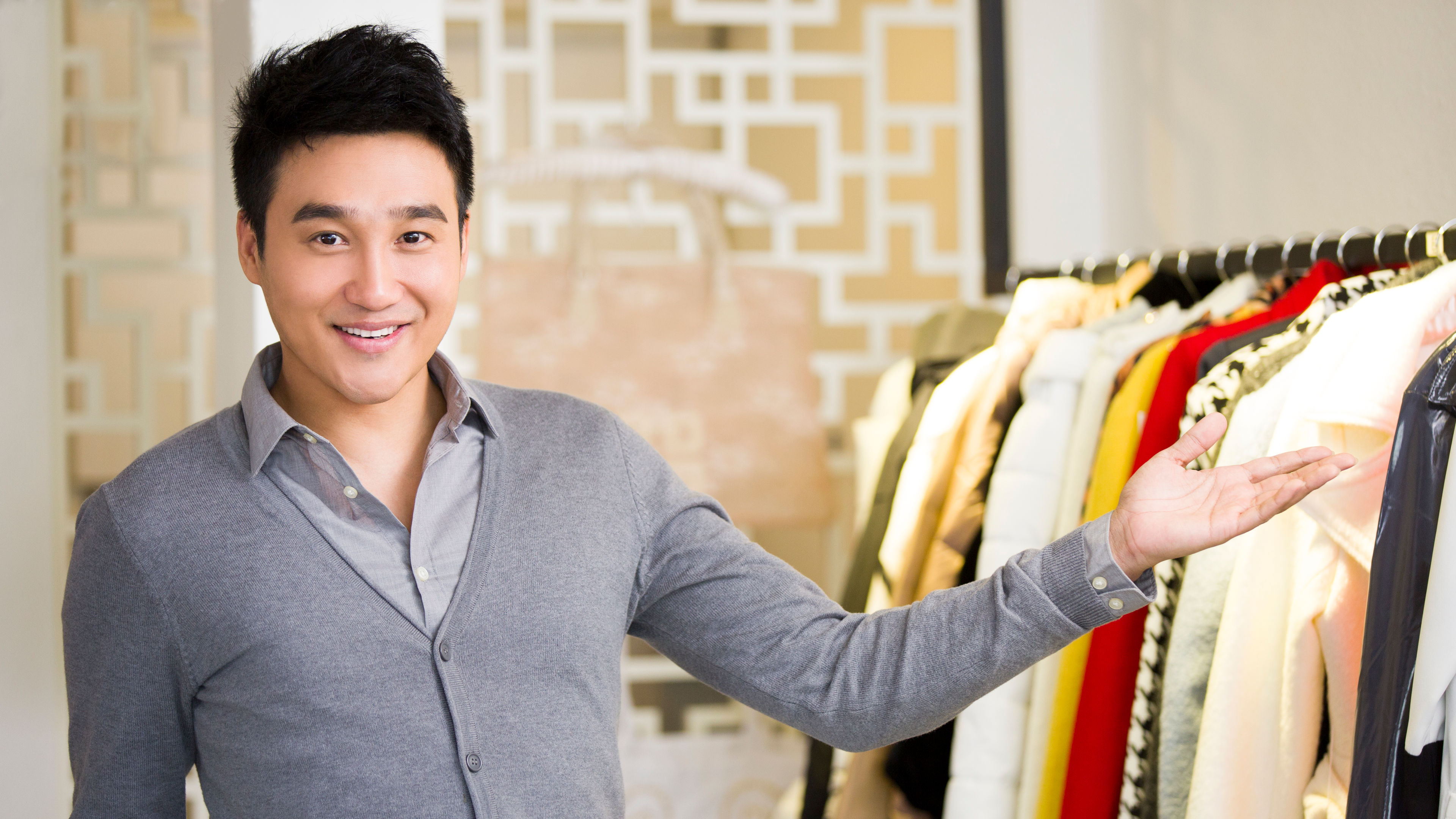 A young man in a clothing store