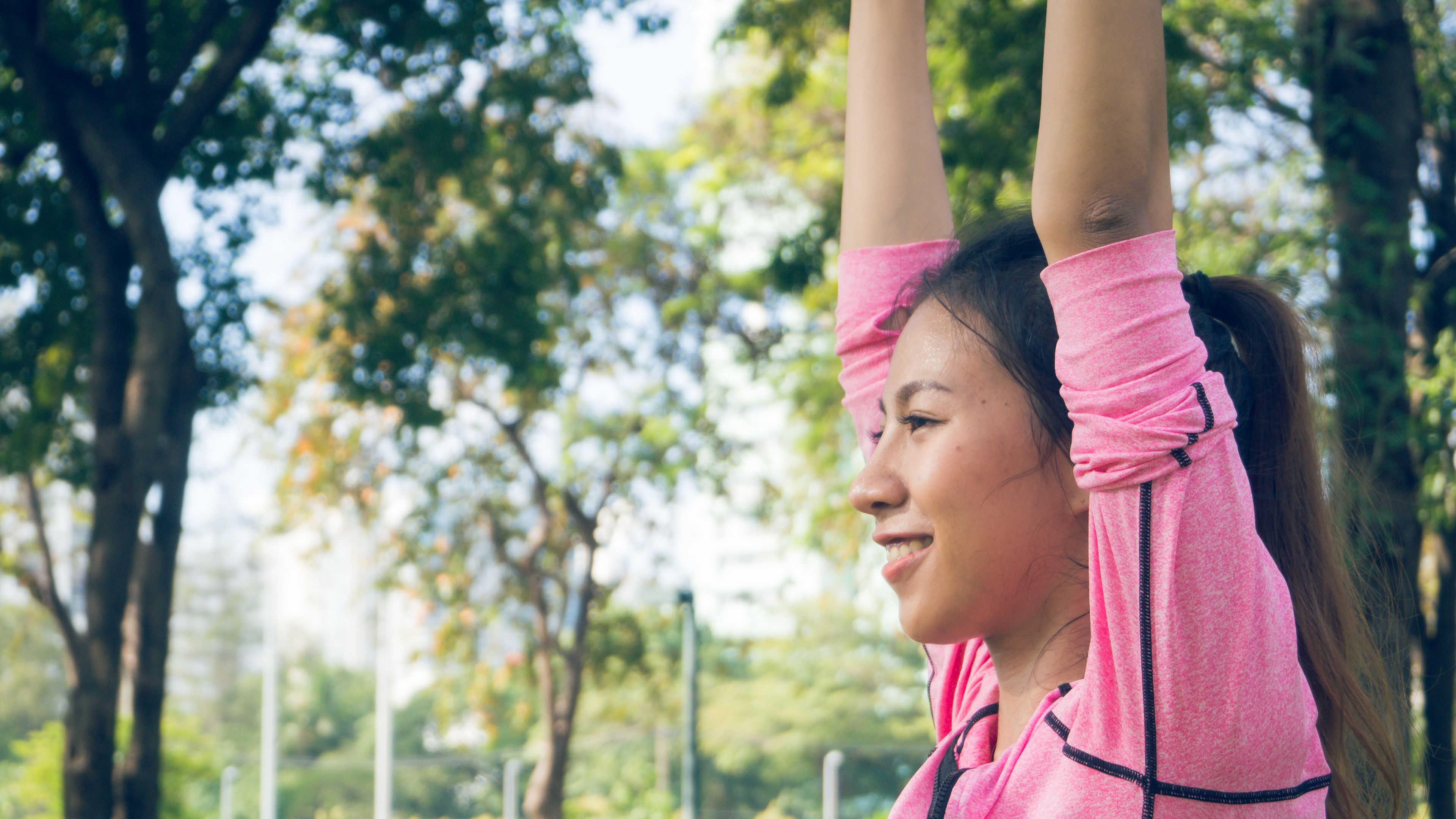 A happy woman doing yoga. 