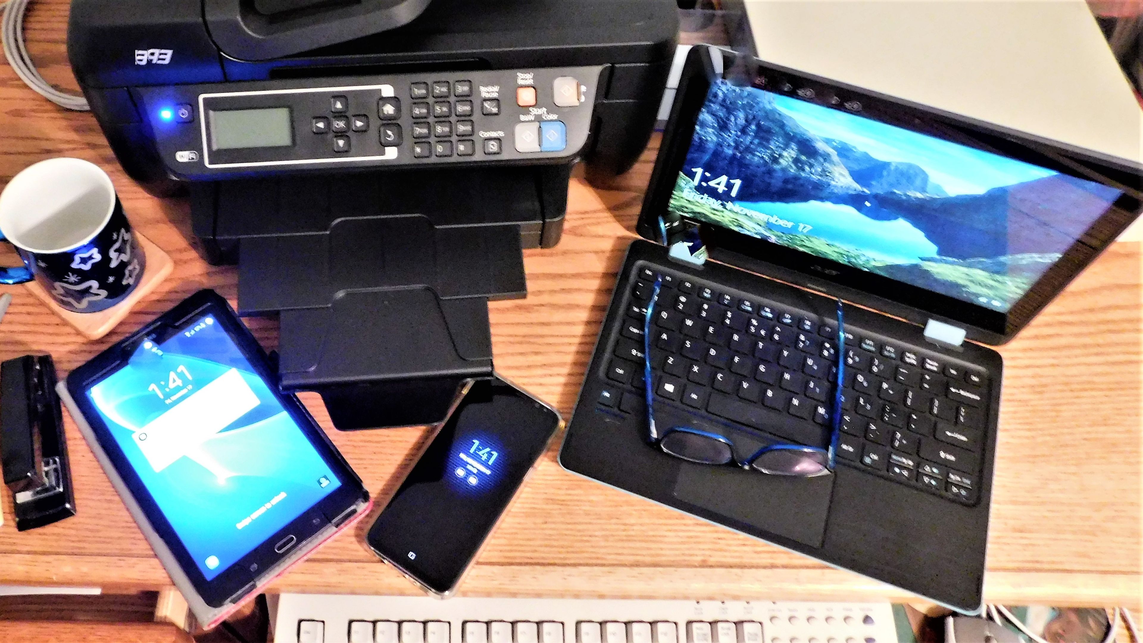 Latest electronic equipment on the wooden desk 