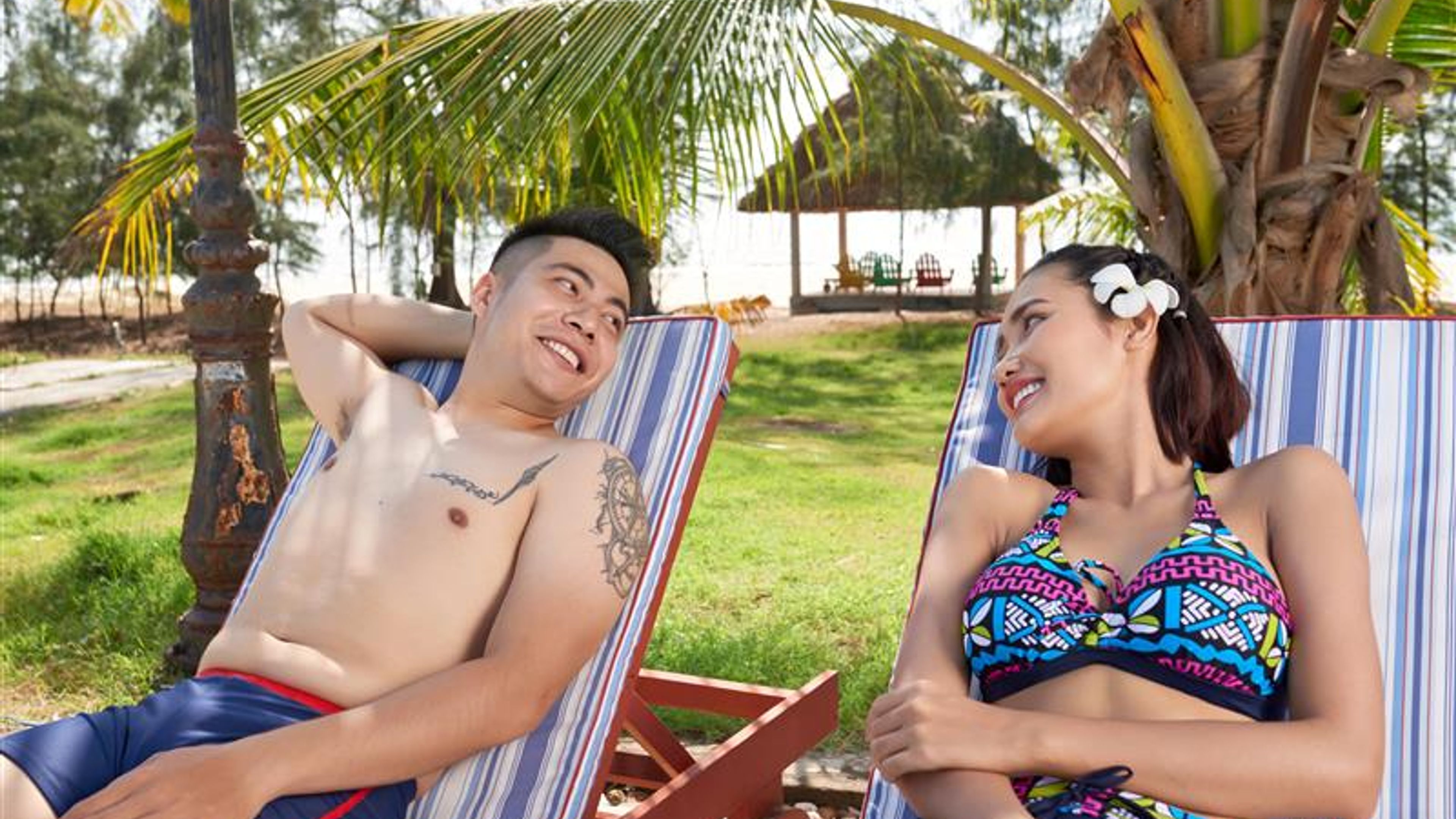 Happy couple resting at the resort 