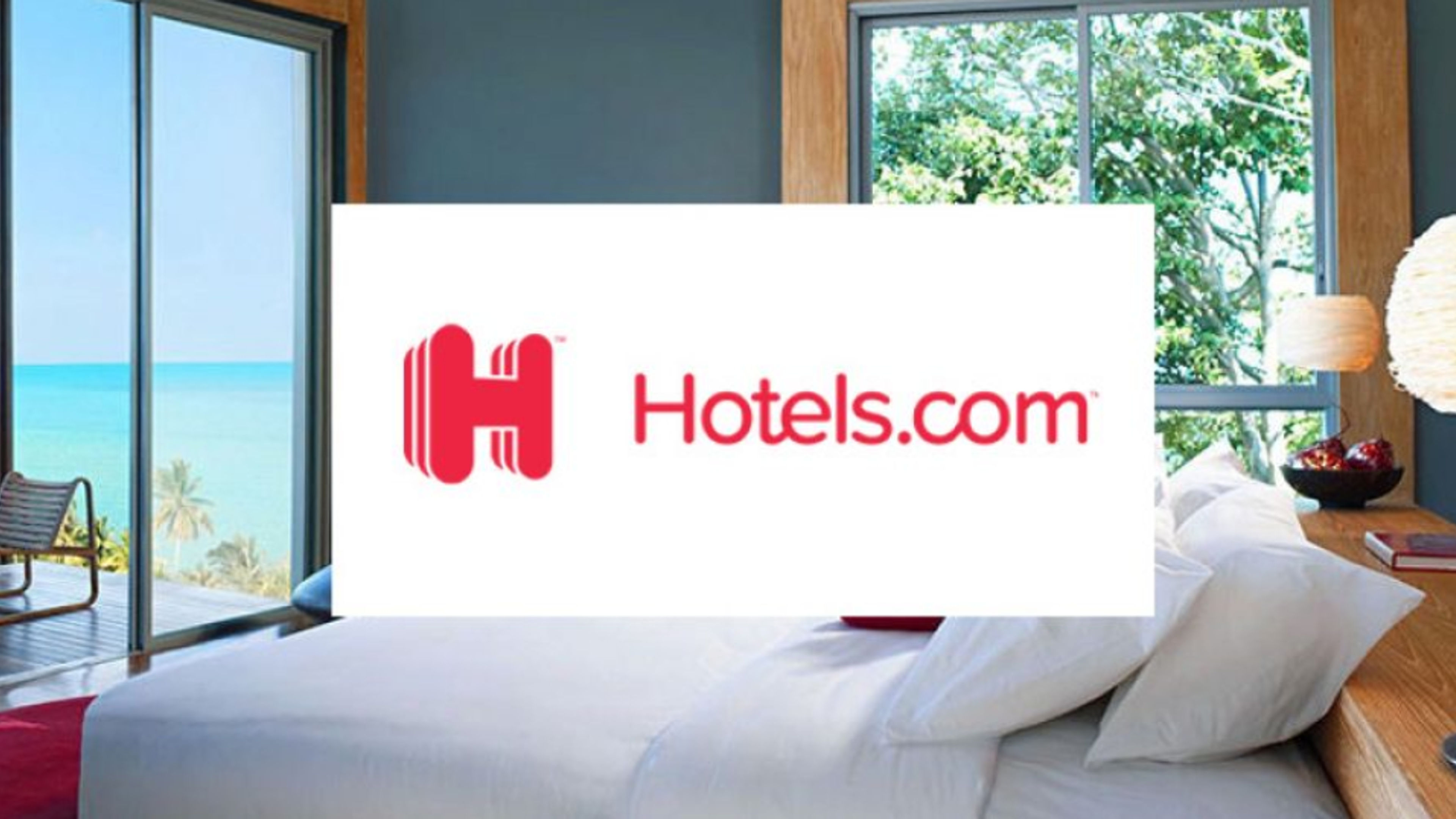 Image of Hotels.com written near bed 