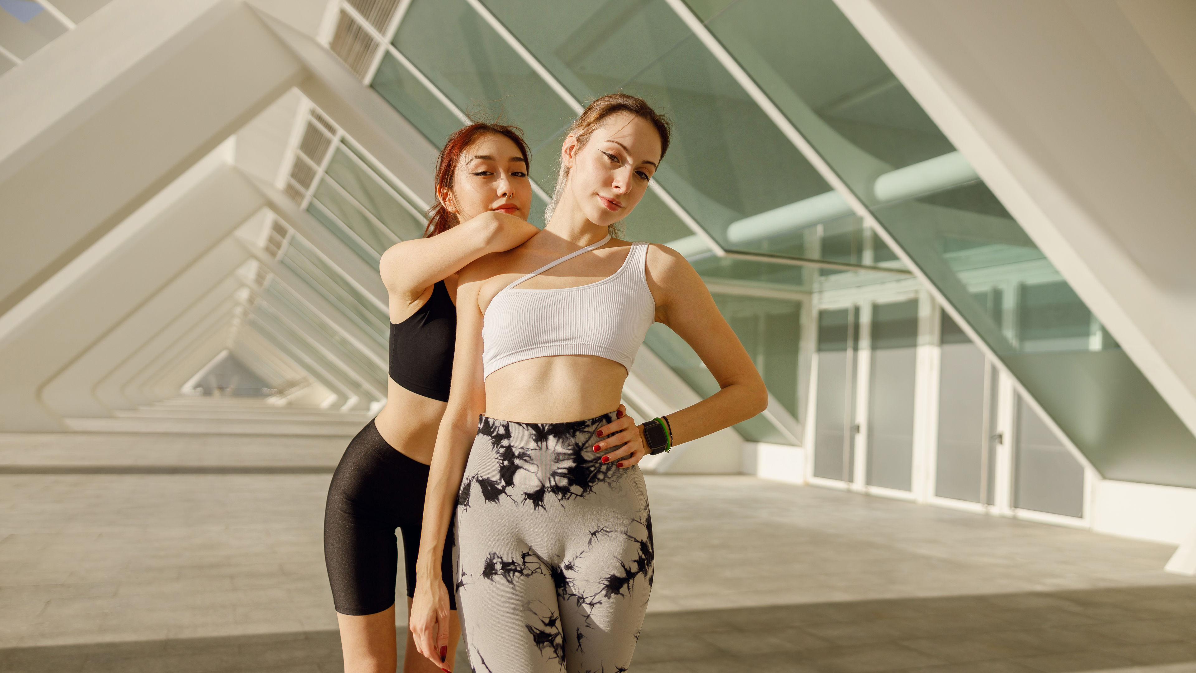 Two young female sportswomen 