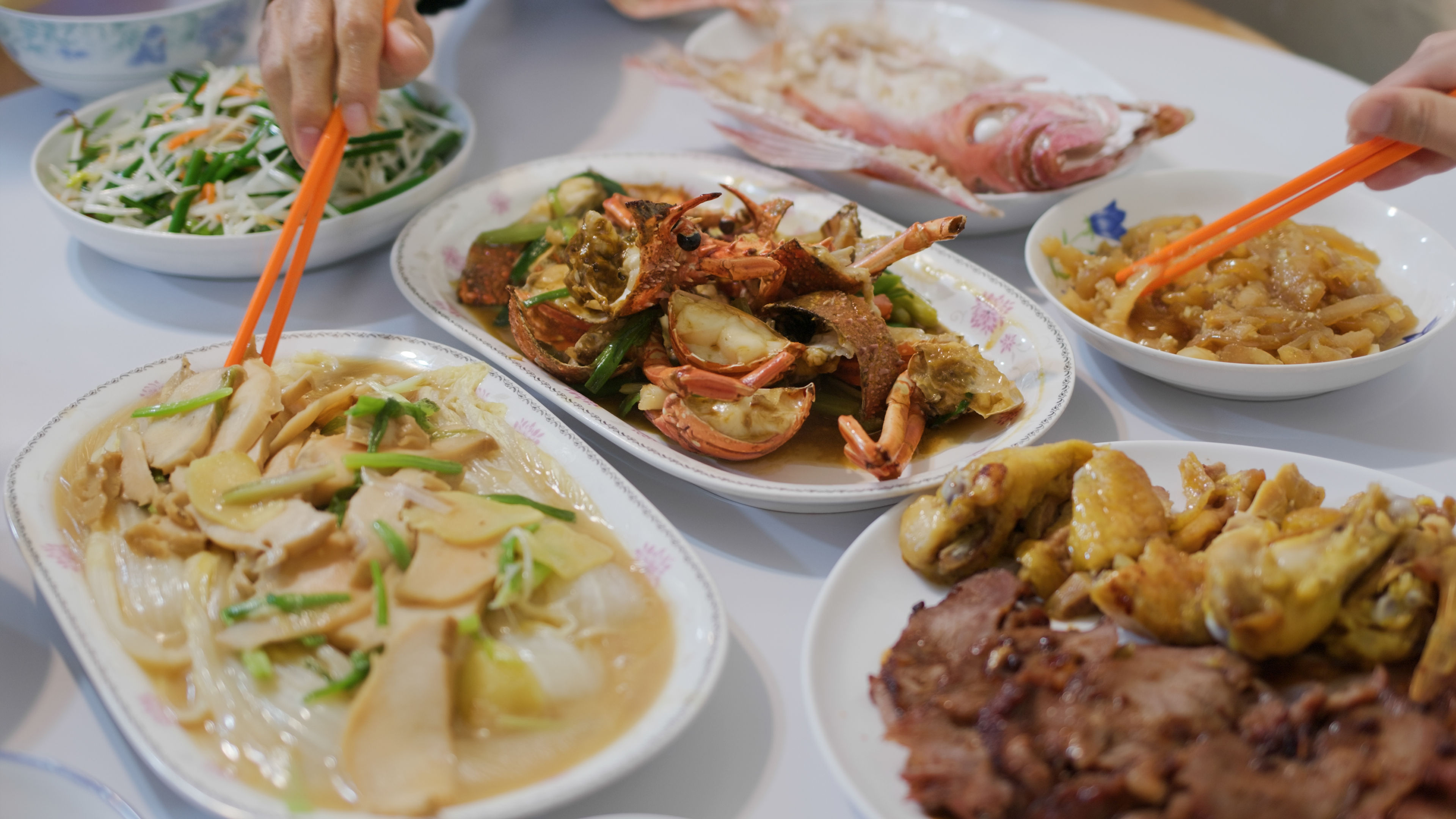 Different delicious food assembled on a table