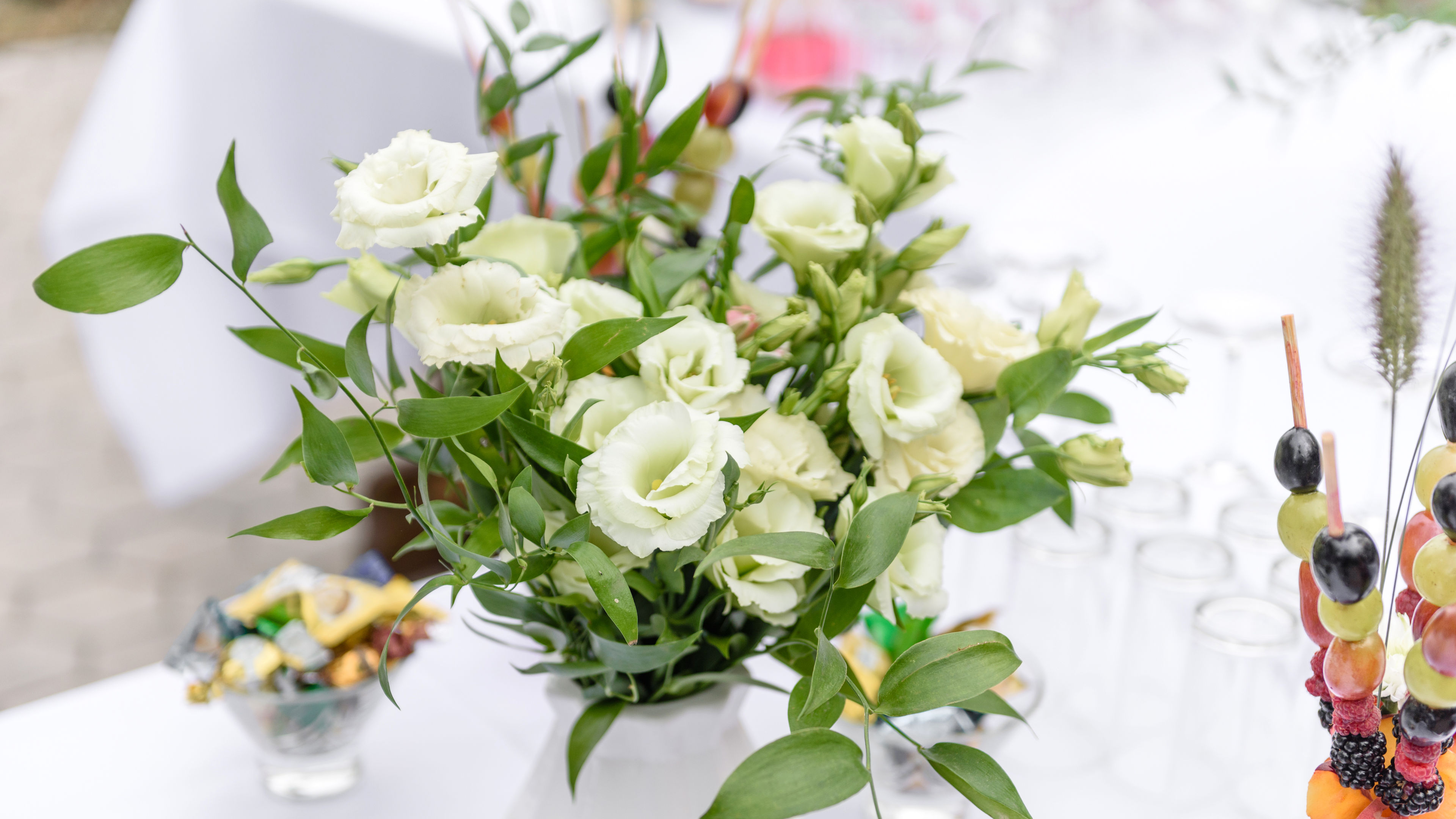 Image of white flowers  arranged on a table 