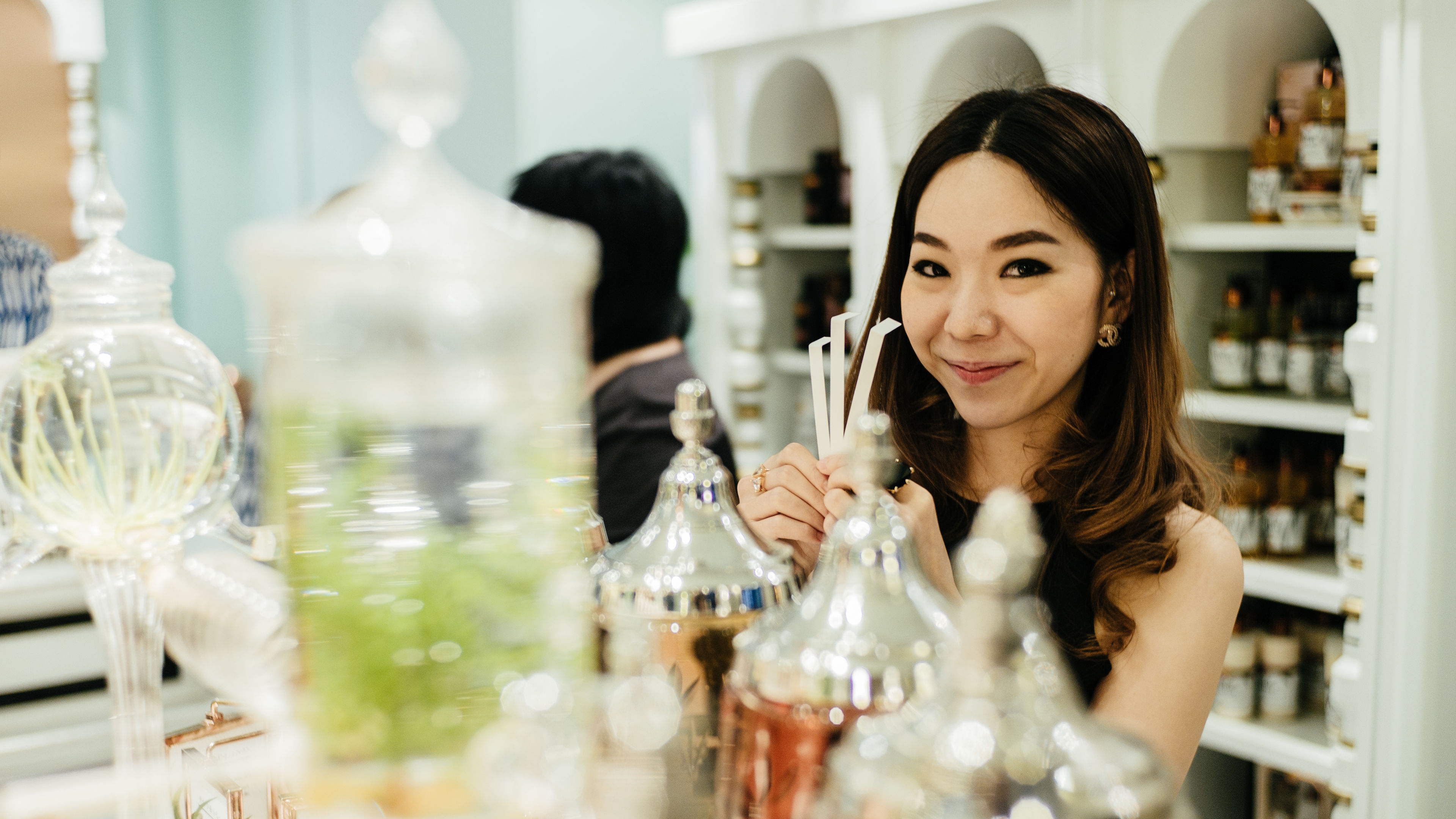 Woman making a custom perfume