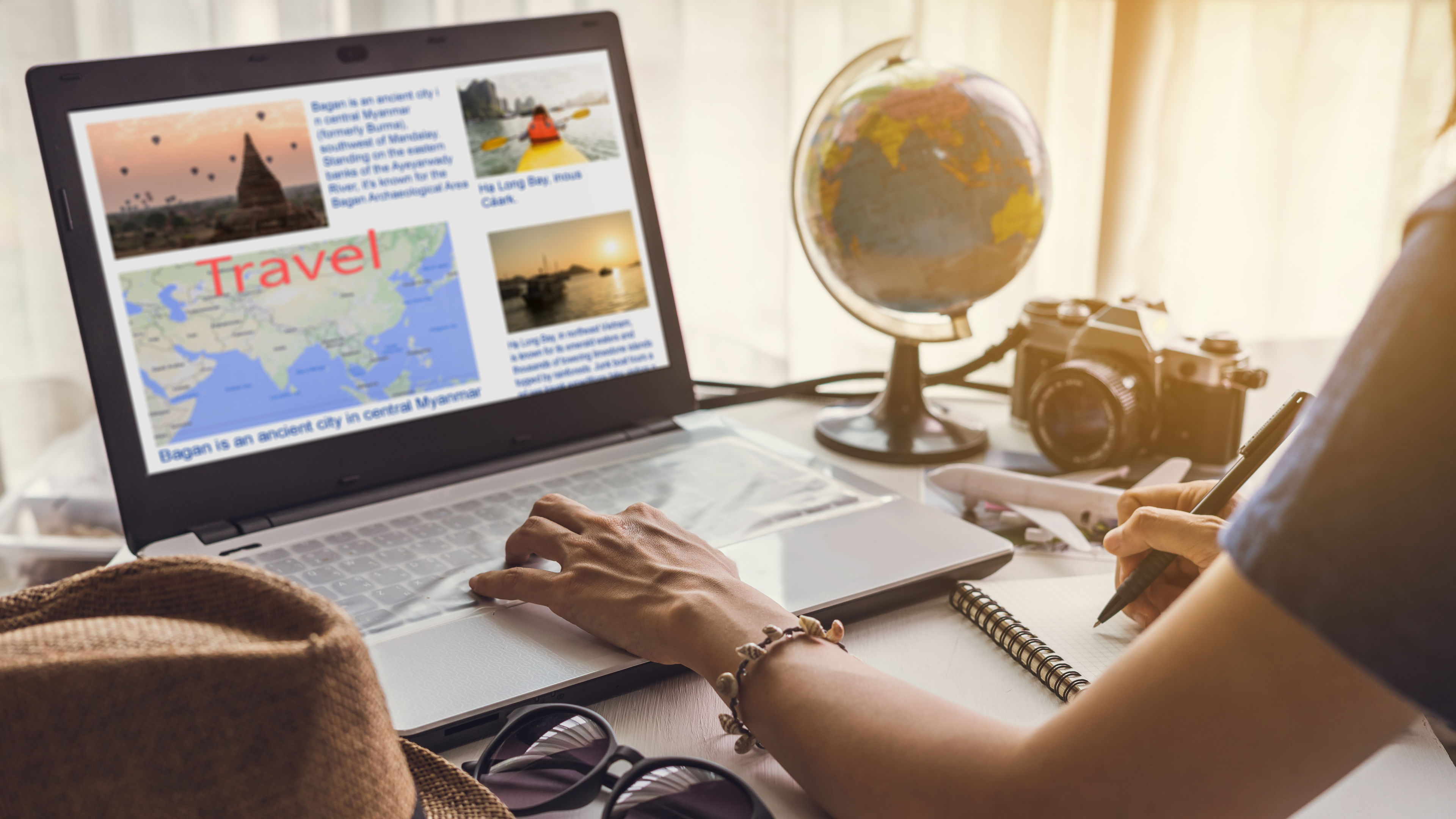 Young women planning an exciting vacation, booking and organizing their trip. 