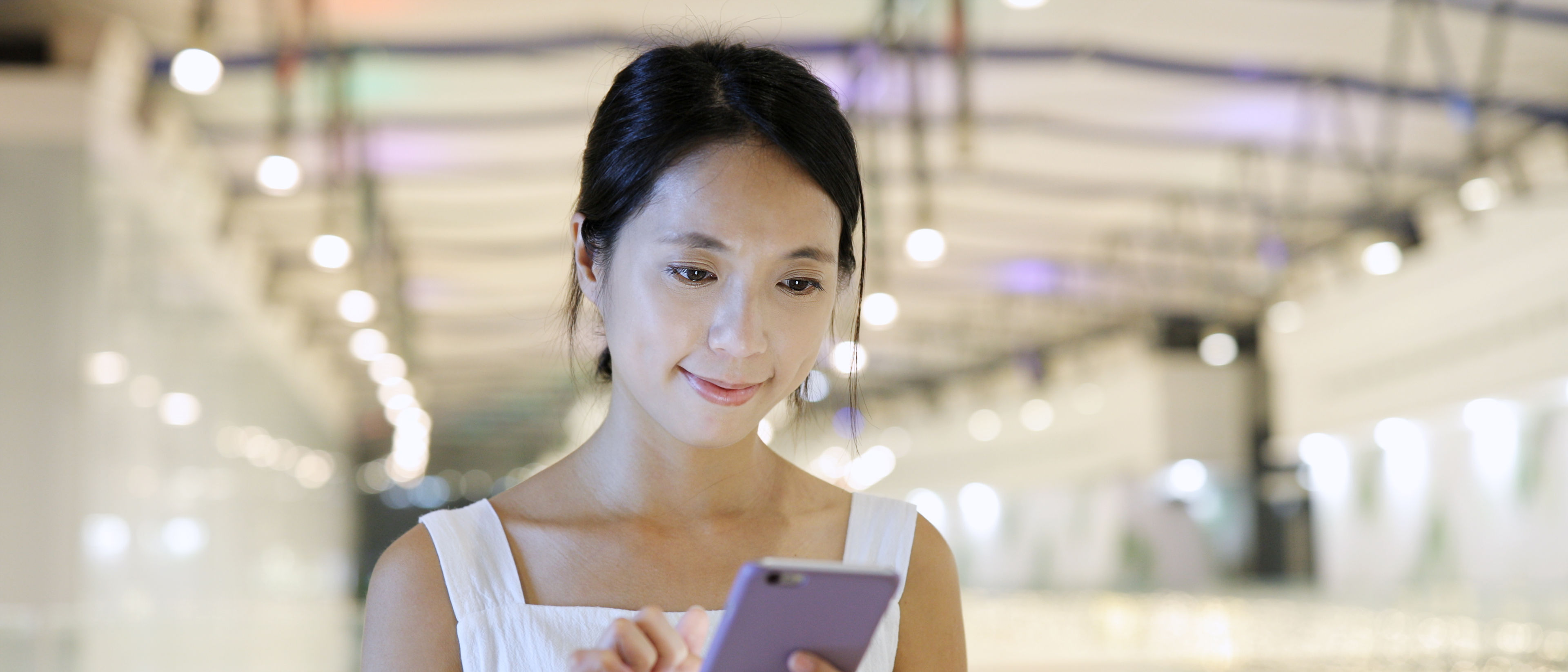 Woman using mobile phone