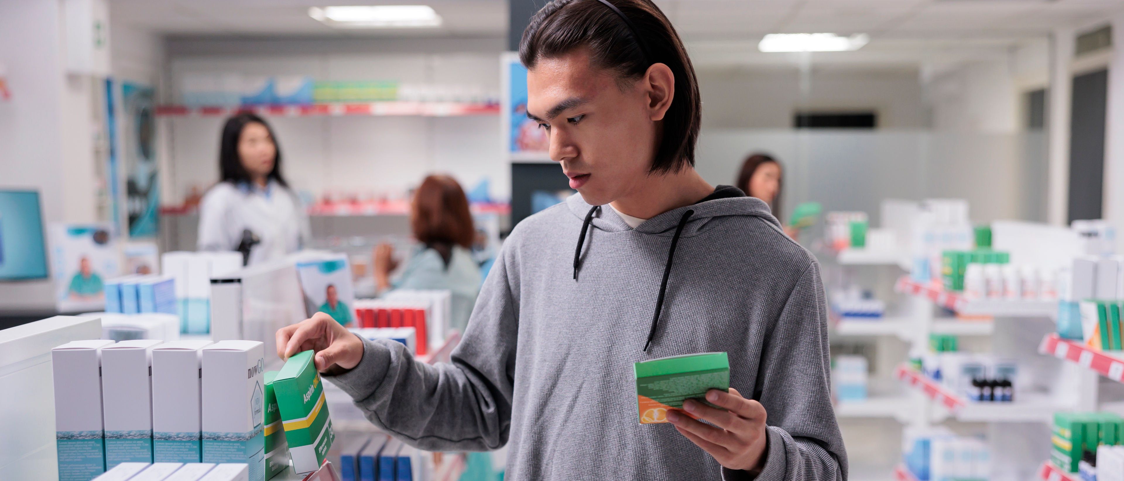 Man examining supplement