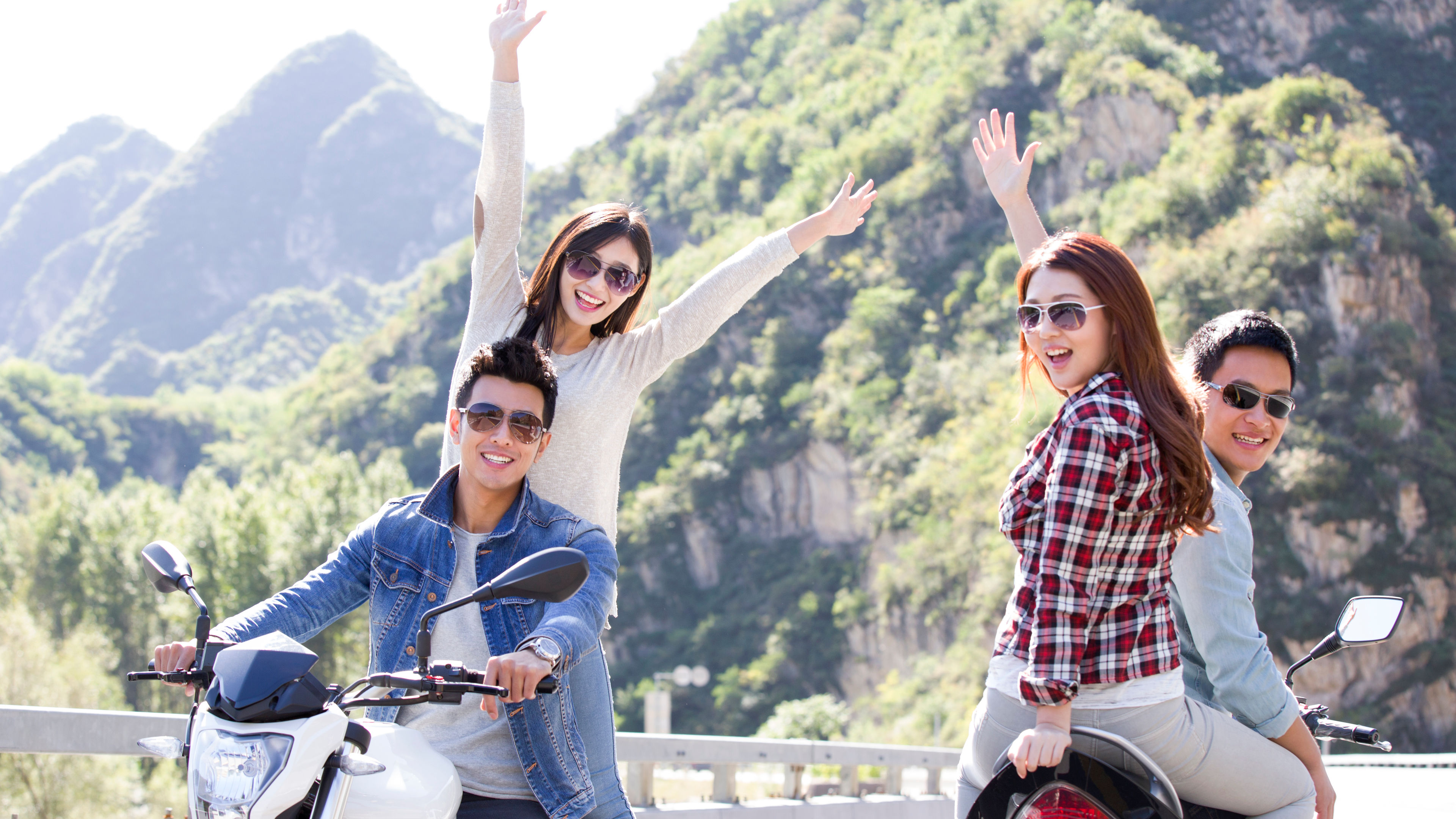 Some friends go for a ride in bikes
