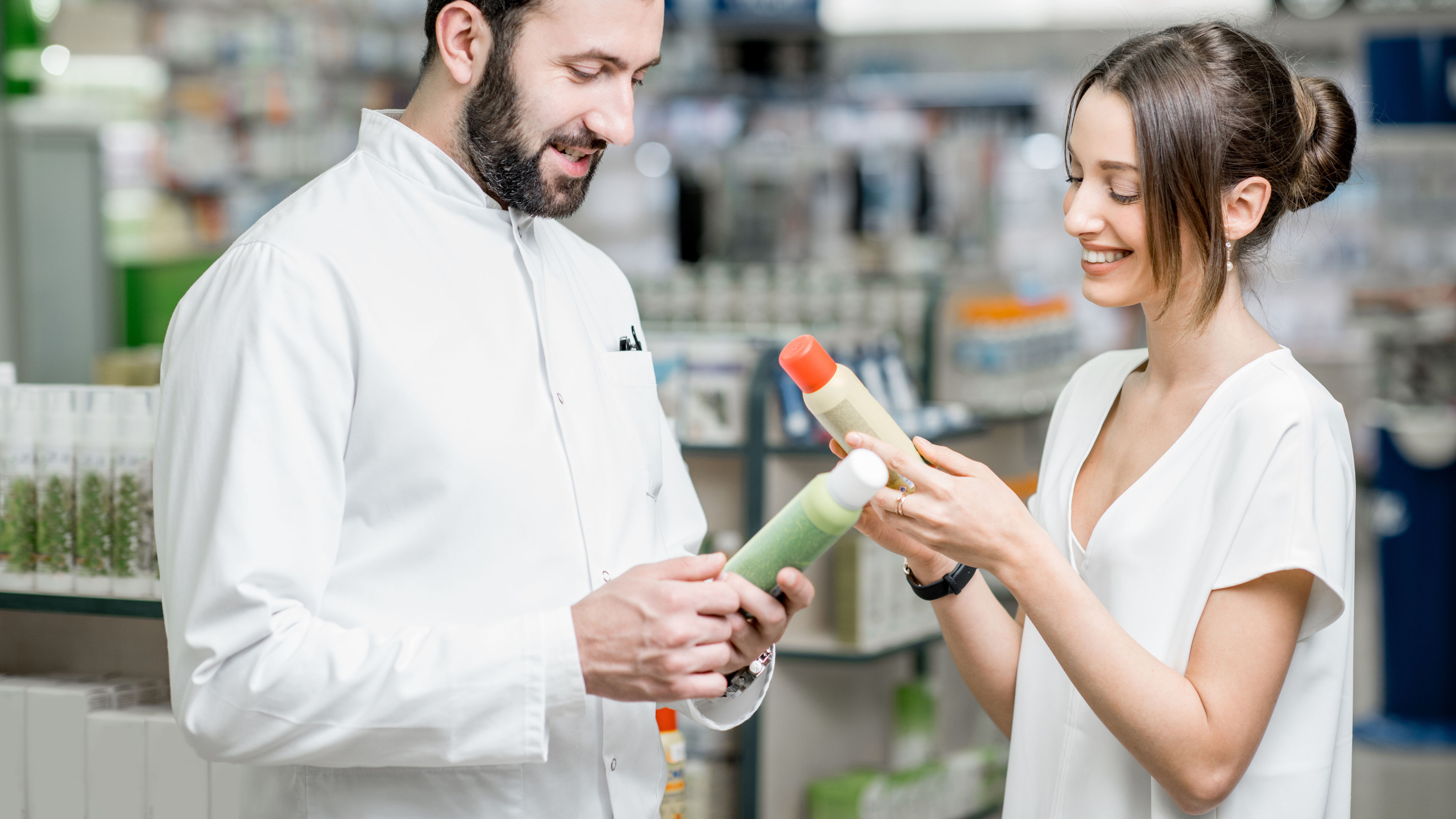 A man and a woman with health and beauty products.