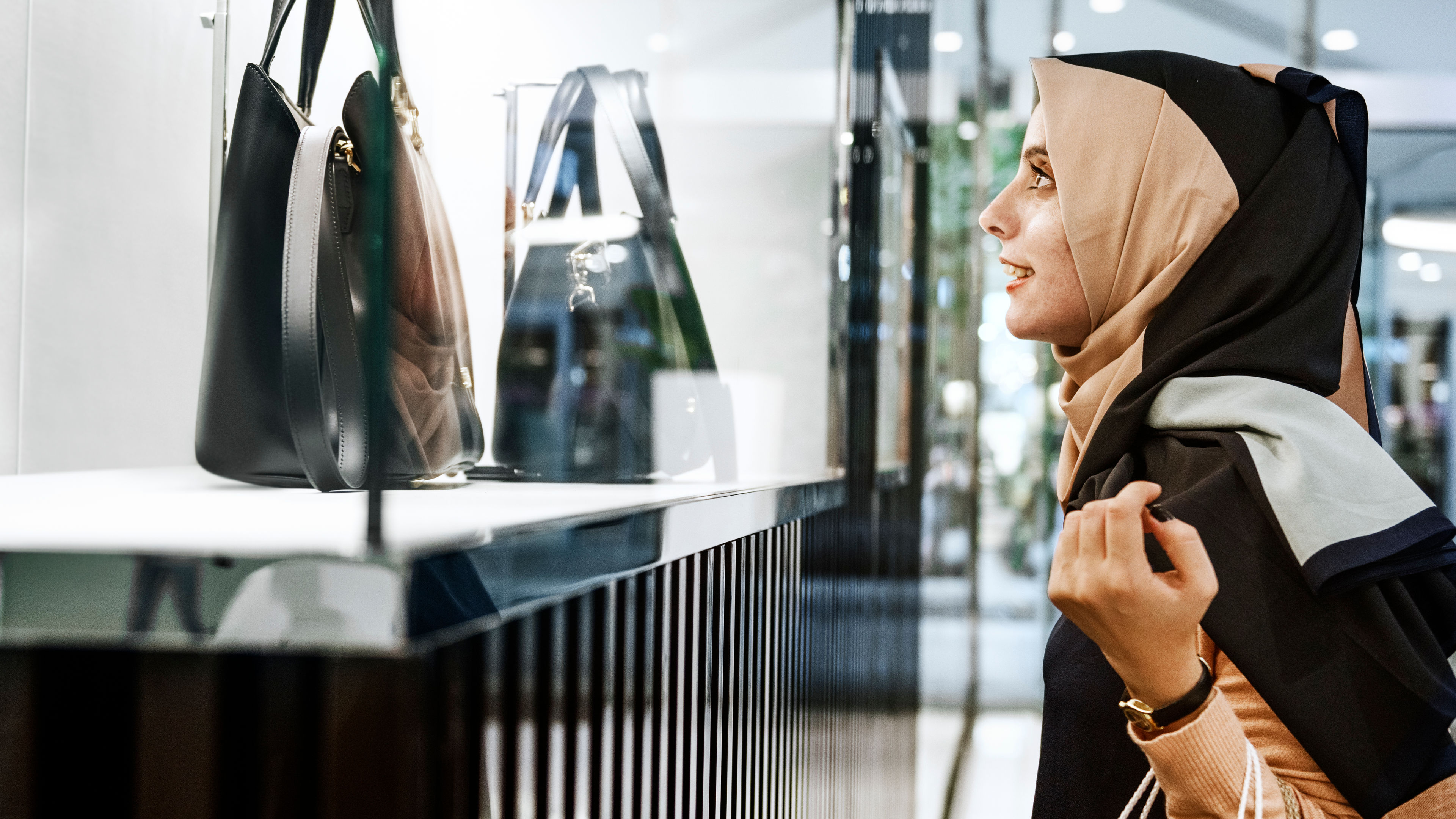 A woman looking at bags