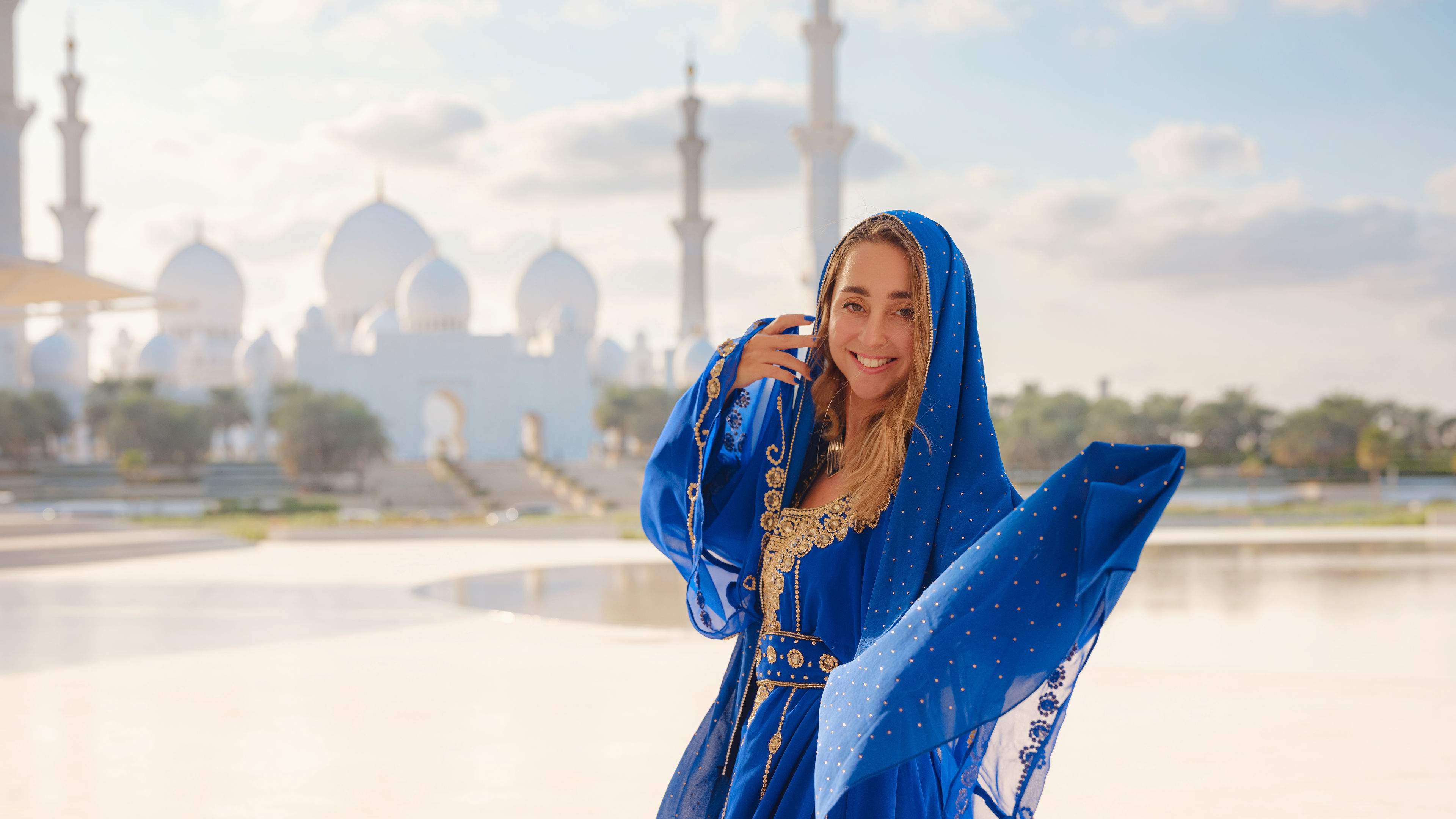 Woman in blue kaftan