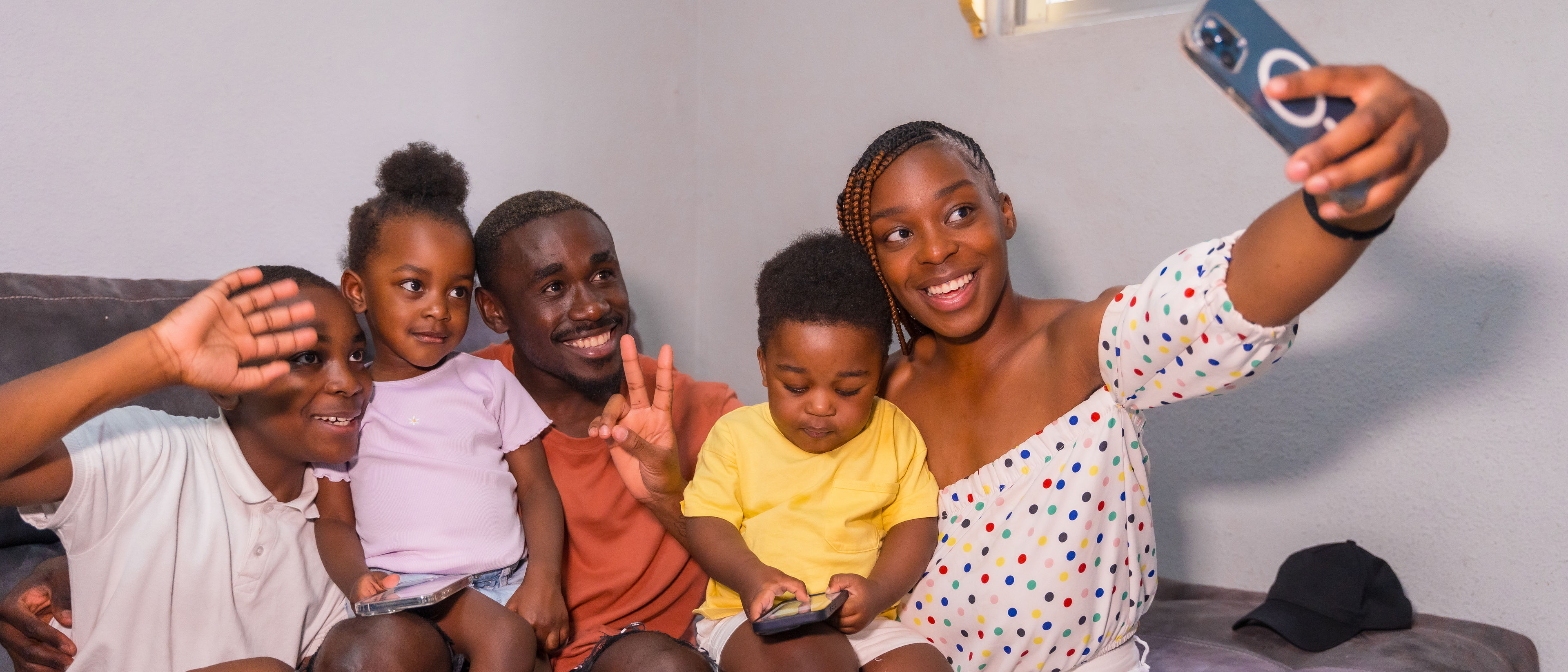 family taking selfie together 