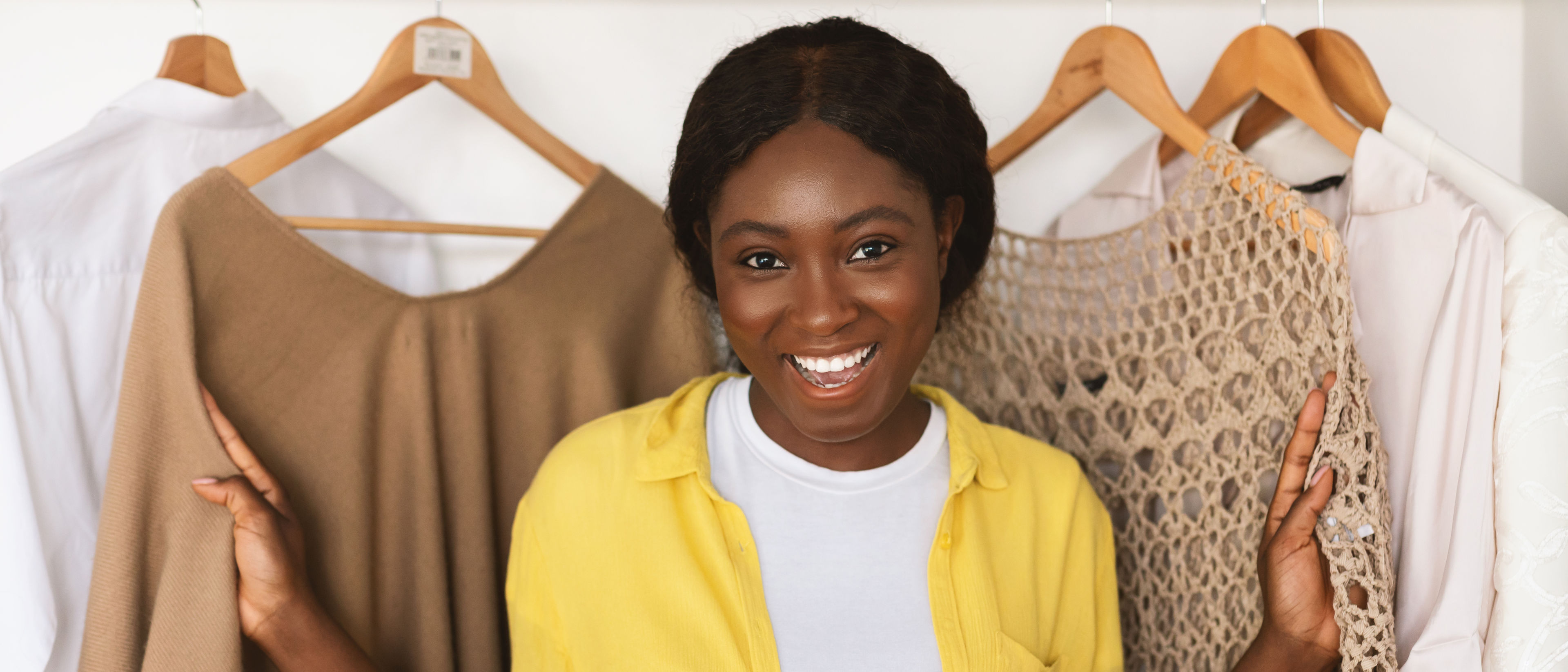 Woman posing in front of wardrobe