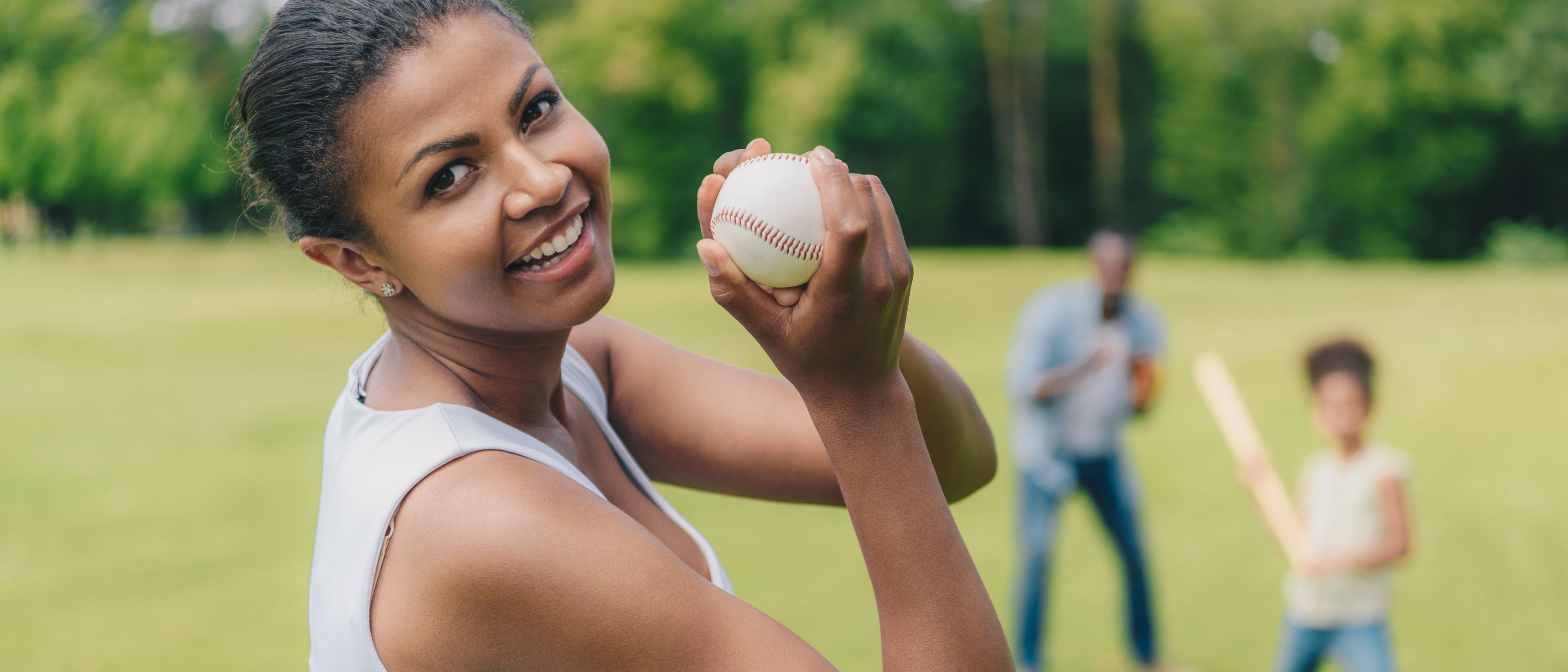 Woman with a base ball