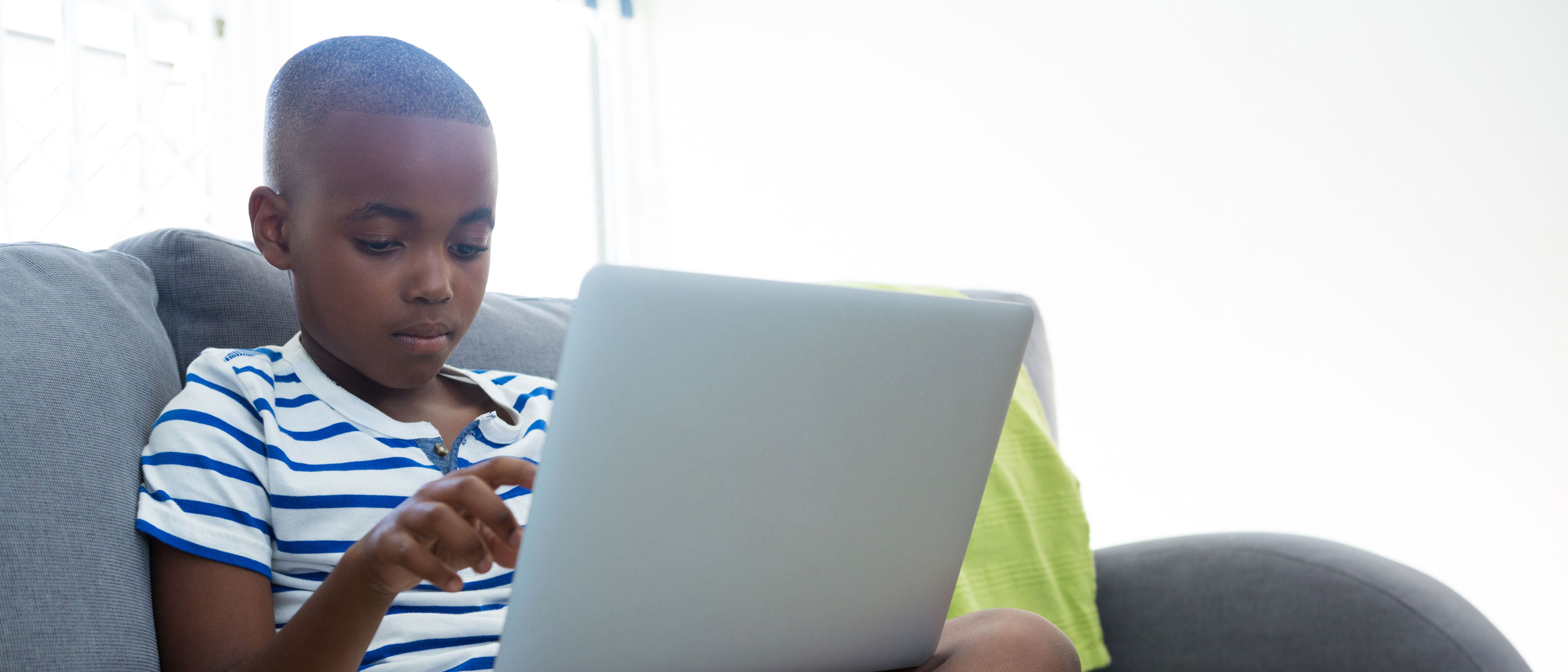 Boy using laptop