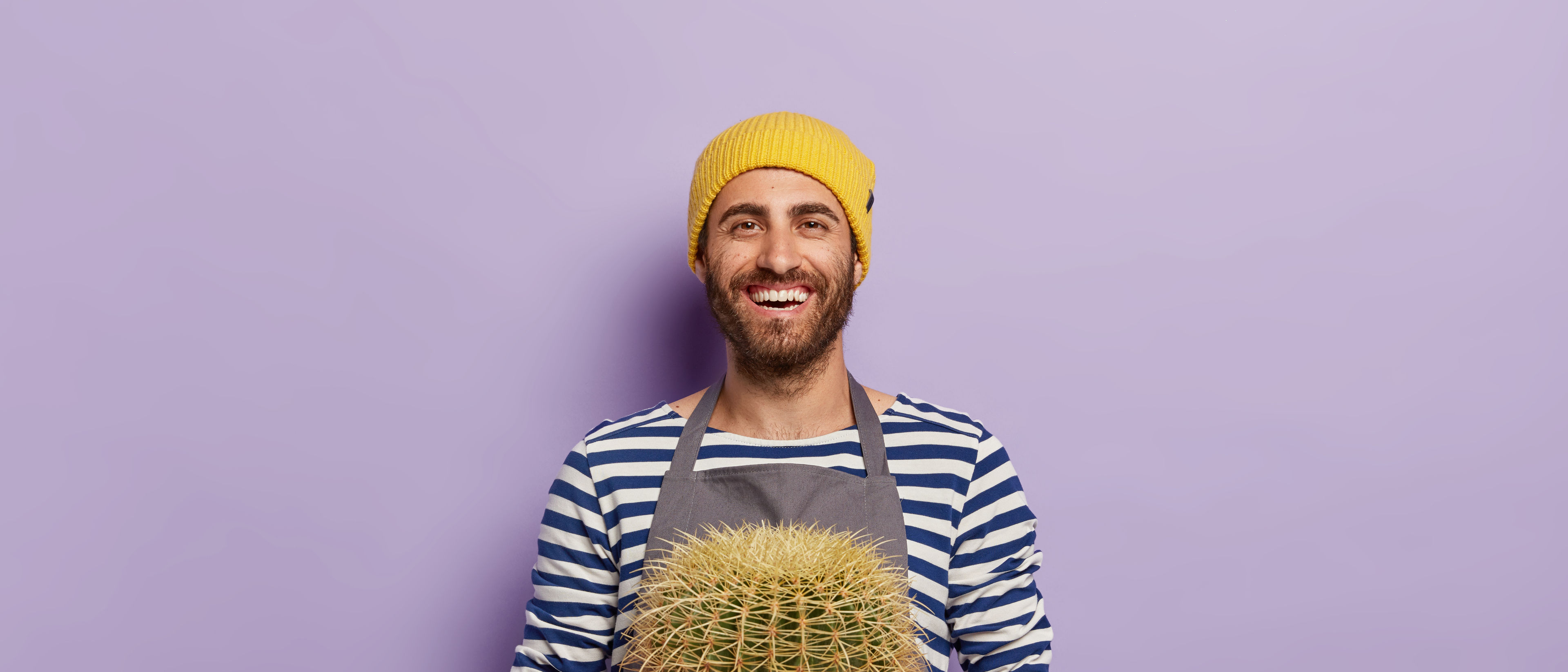 Man holds a plant pot