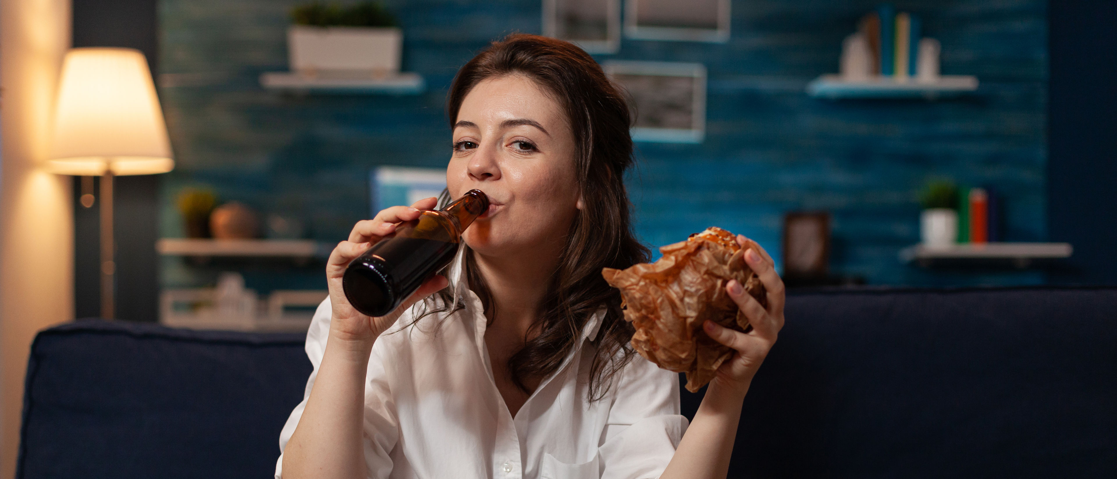 Woman eating burger