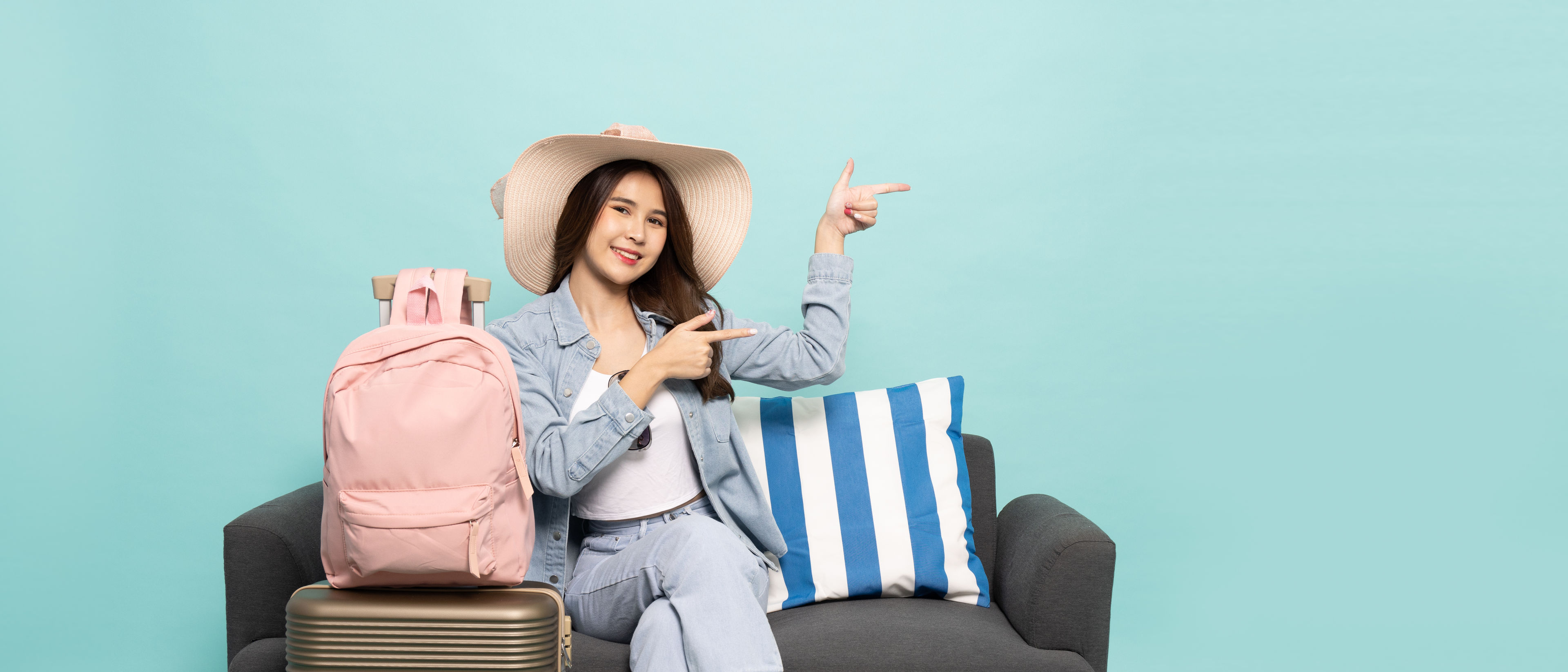 Woman sitting near suit cases