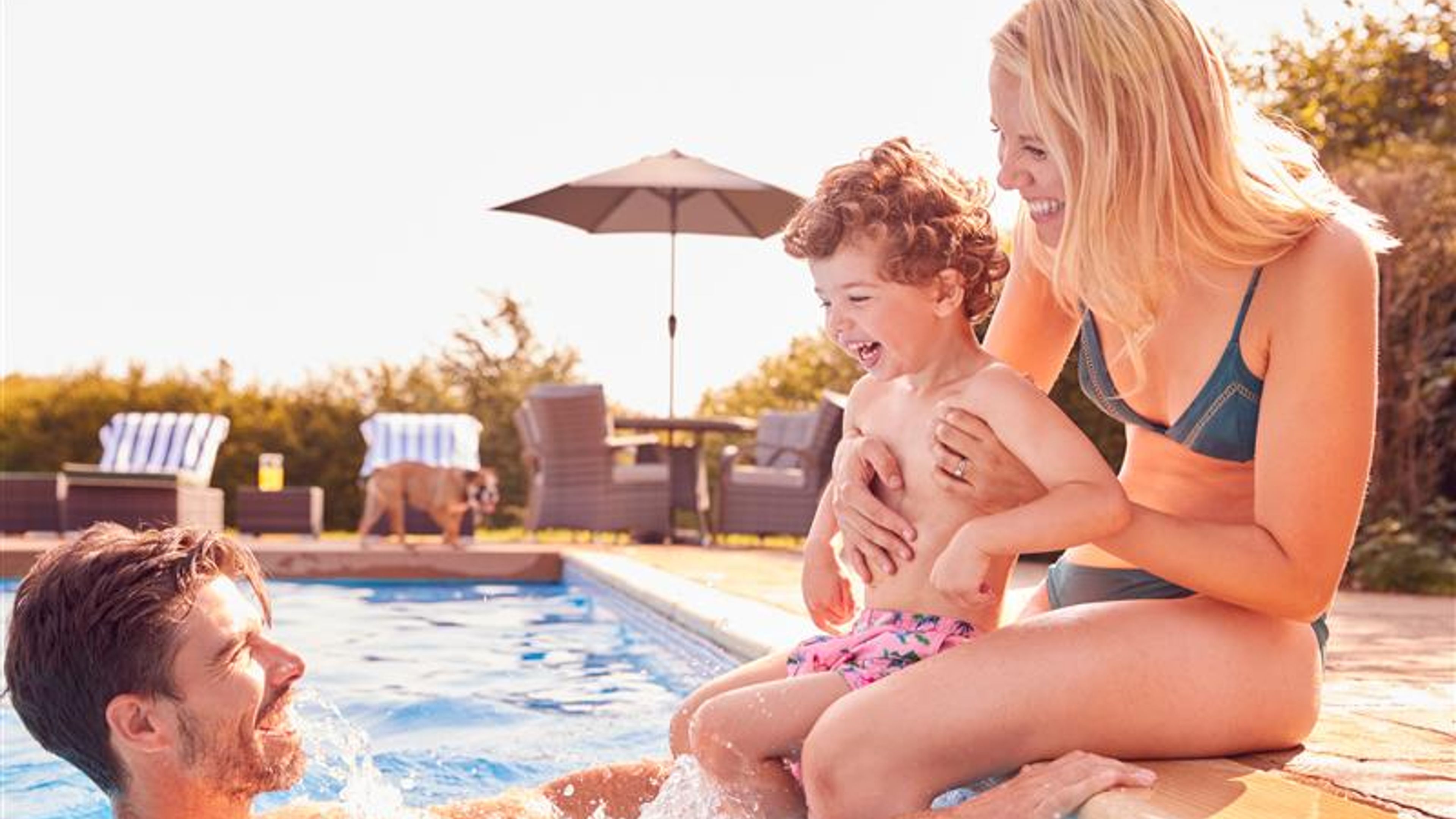 A family enjoying the pool
