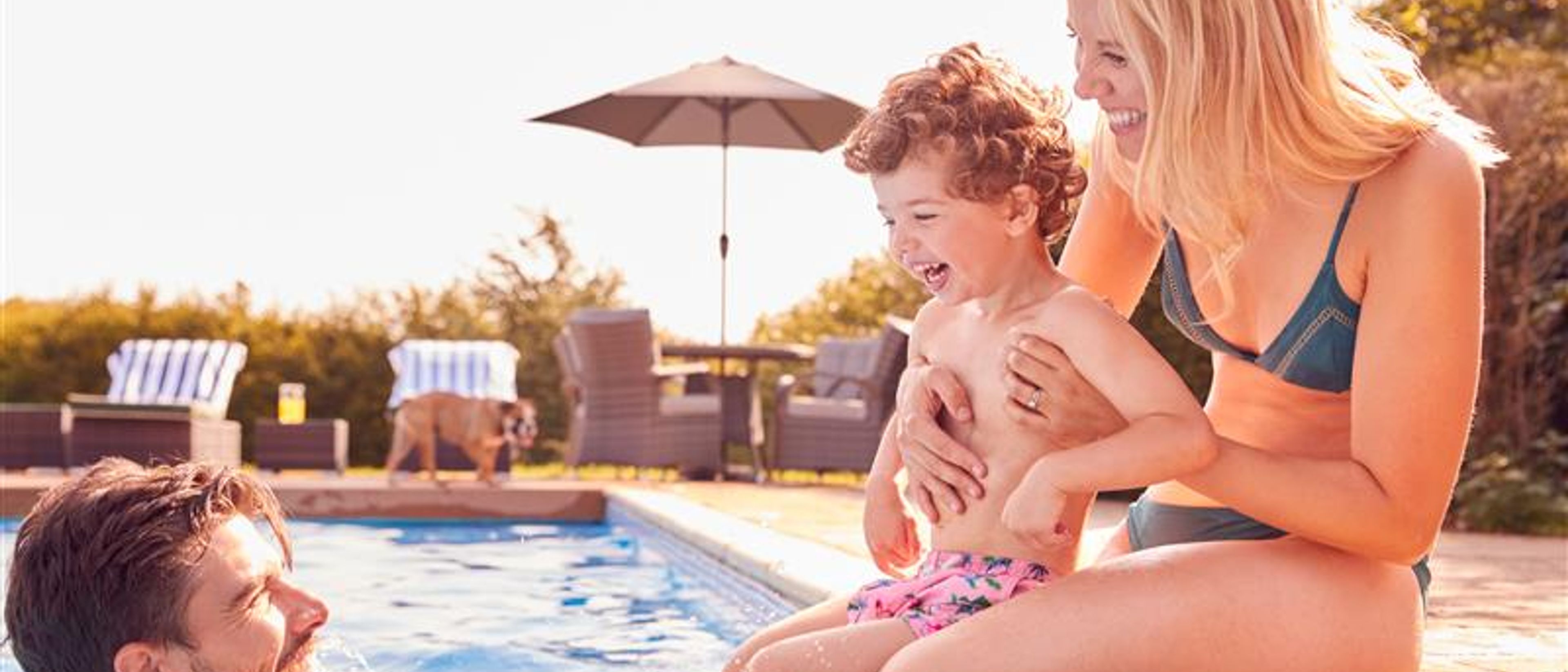 A family enjoying the pool