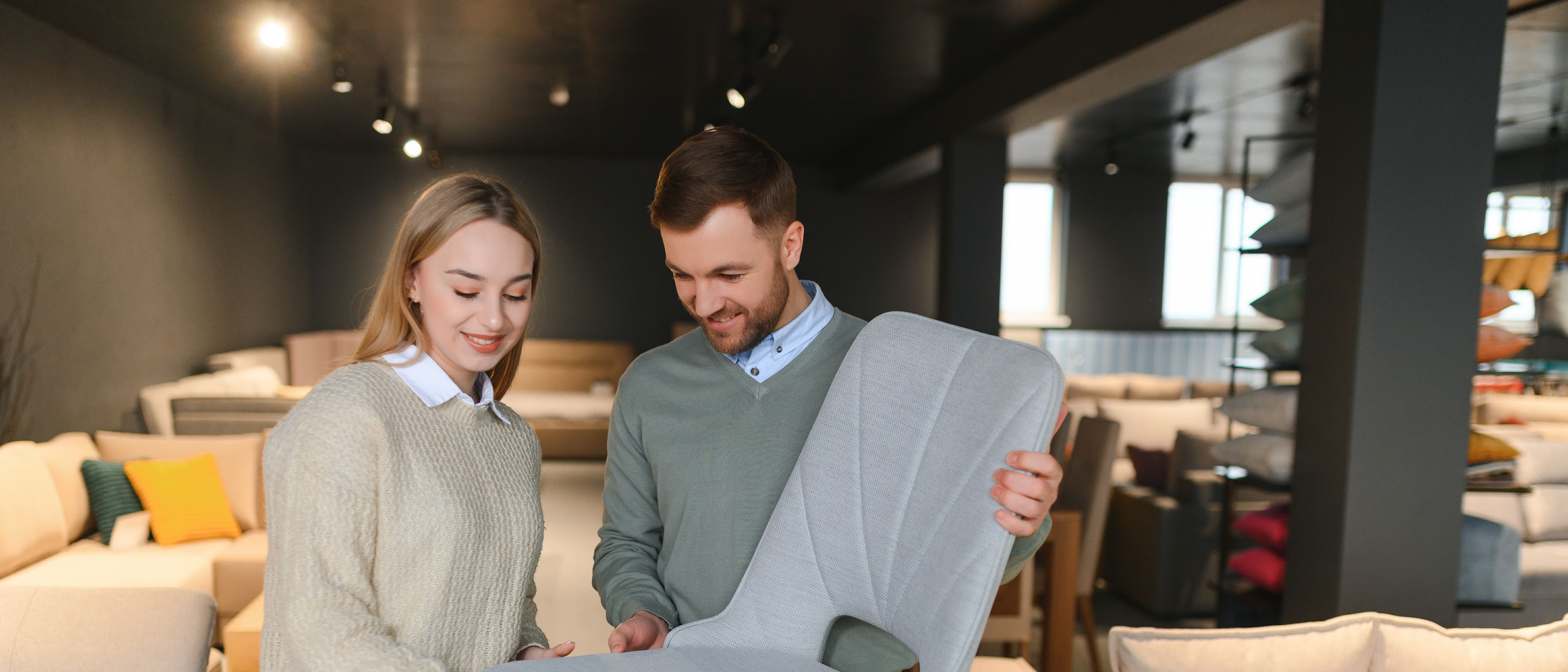 Couple choosing furniture