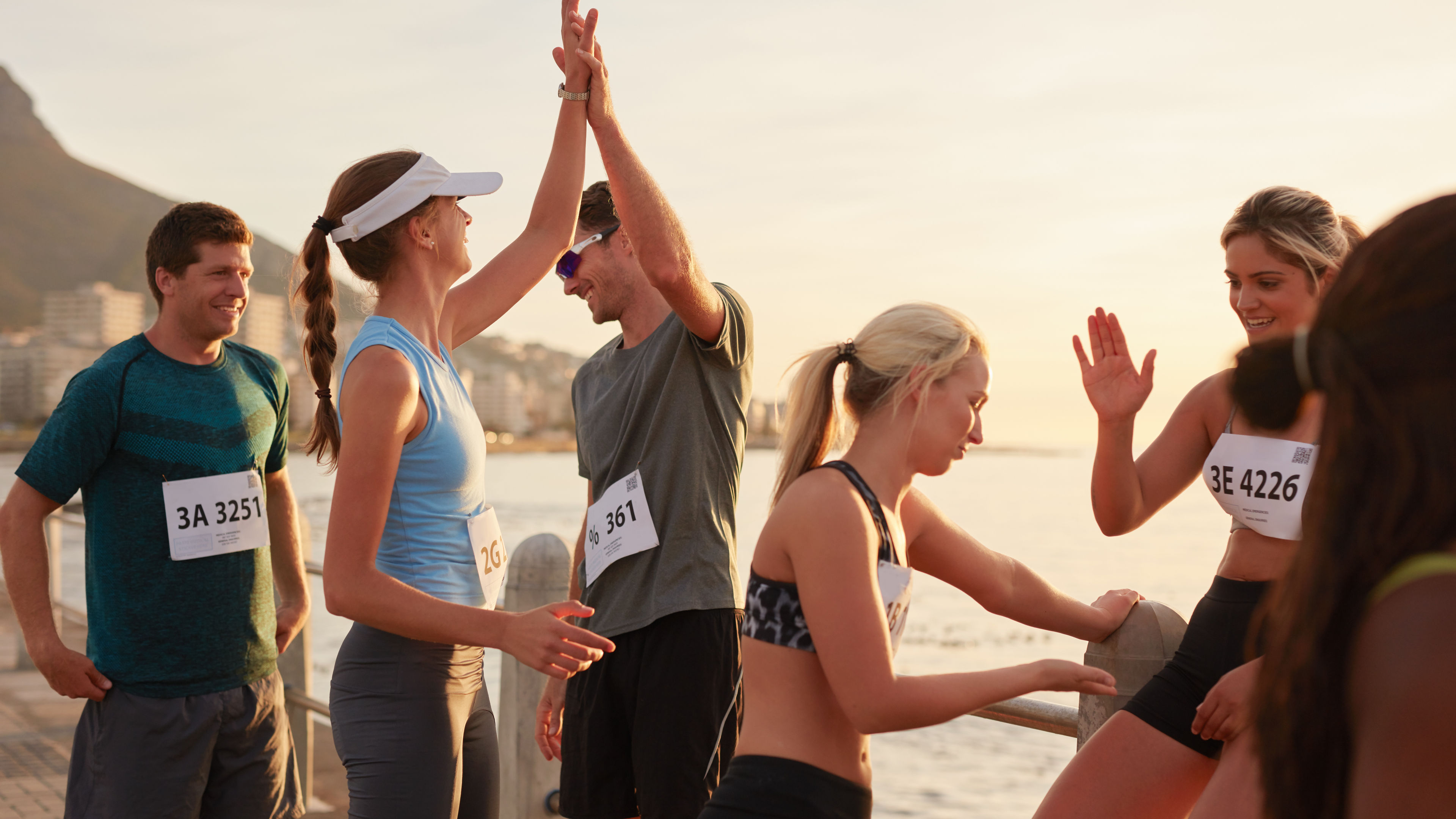Some people celebrate victory after a race